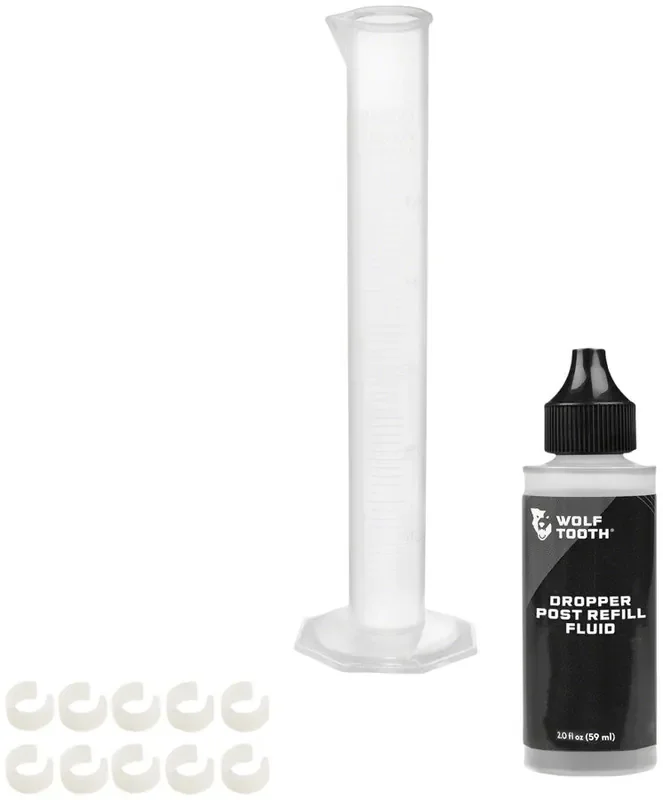 Wolf Tooth Resolve Dropper Post Service Kit – Refill Fluid 2oz Graduated Cylinder 10 Travel Adjustment Spacers